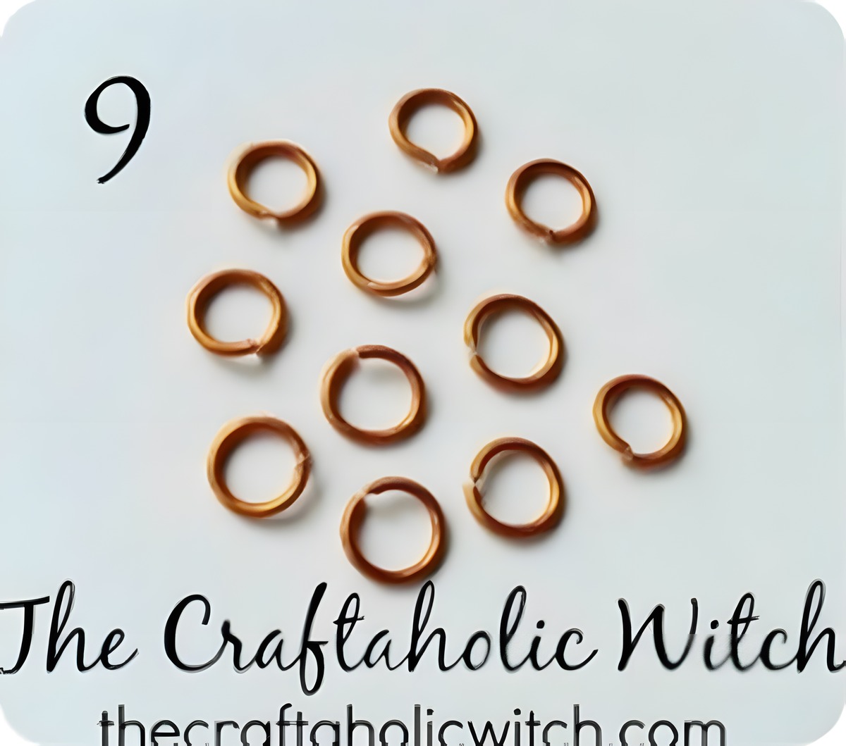 A collection of finished copper jump rings made from craft wire, ready for jewelry making