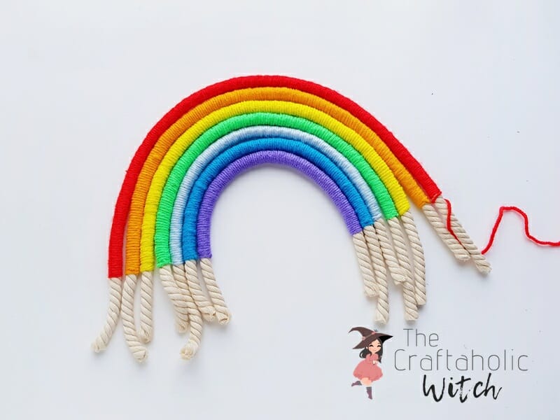 Macrame Rainbow Step 5: Attach Everything to the Felt Macrame rainbow wall hanging step 5: all wrapped ropes glued in place on the felt backing
