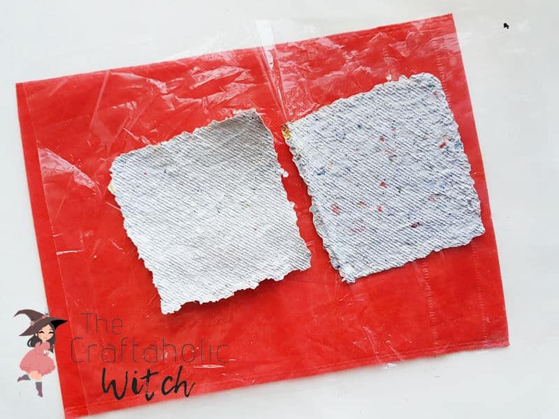 Place the Paper Mache Side on a Non-Sticky Surface Place the Paper Mache Side on a Non-Sticky Surface
