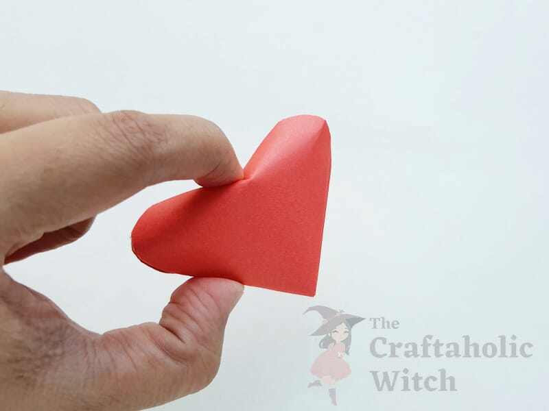 Step 11: Fold in the Top Middle Point Step 11: Fold in the Top Middle Point