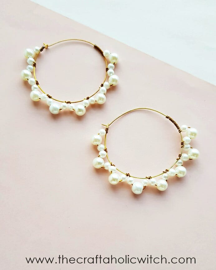 Close view of finished beaded hoop earrings ready to wear