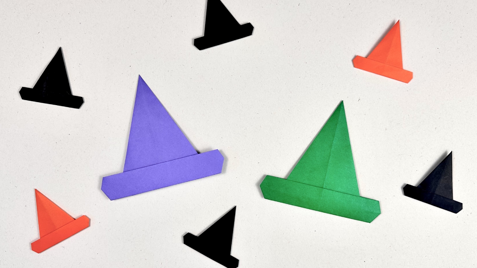 15 Halloween Origami Projects with Step-by-Step Tutorials 13 Origami witch hat: pointed black paper hats in different sizes