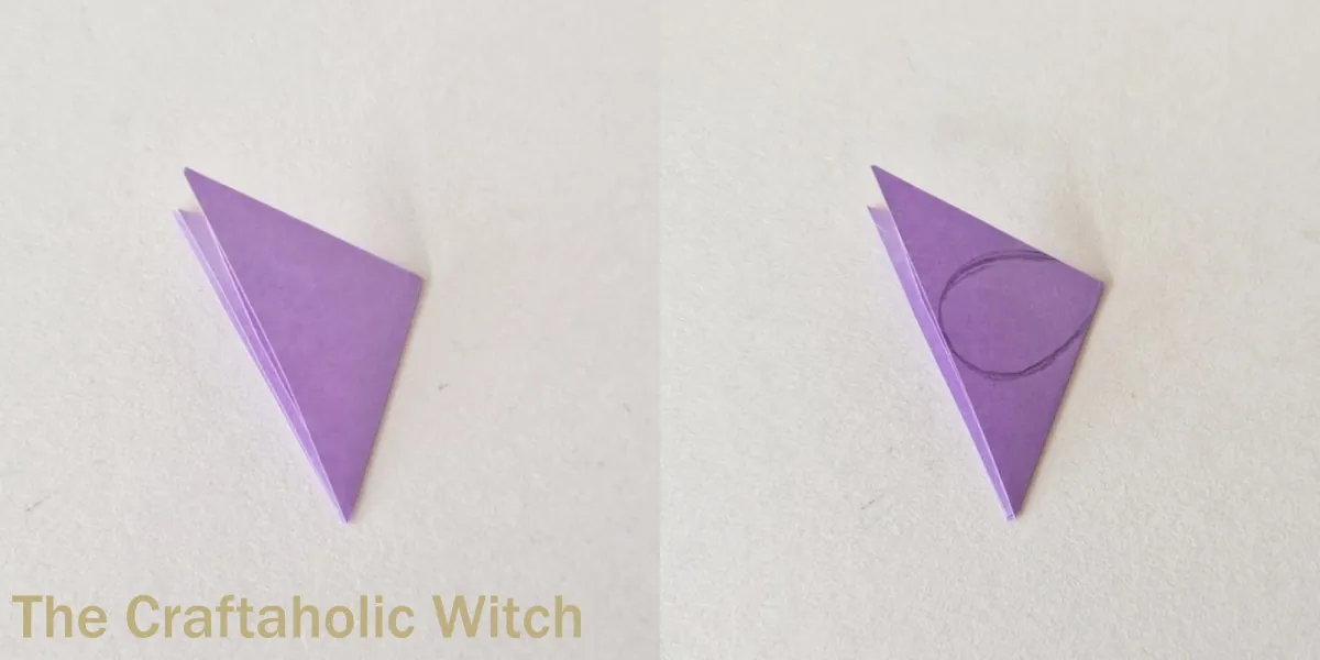 Paper lilac flower craft step 3 Folded purple triangle marked with a rounded petal shape for paper lilac flowers
