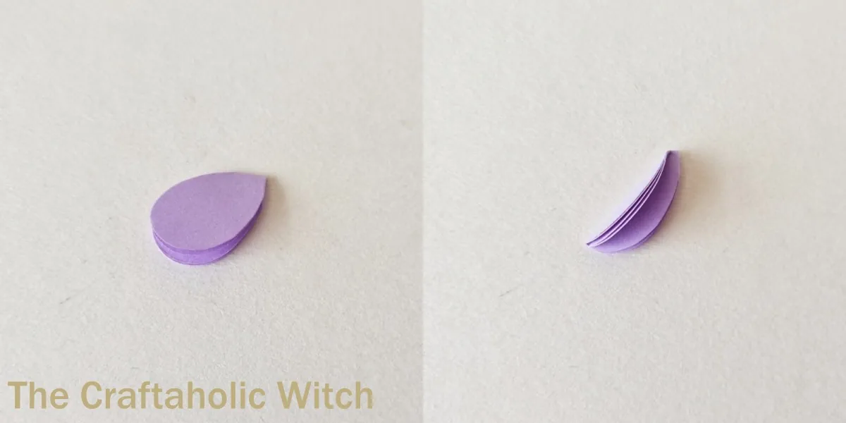 Paper lilac flower craft step 4 Cut folded petal piece for a paper lilac flower before opening the layers