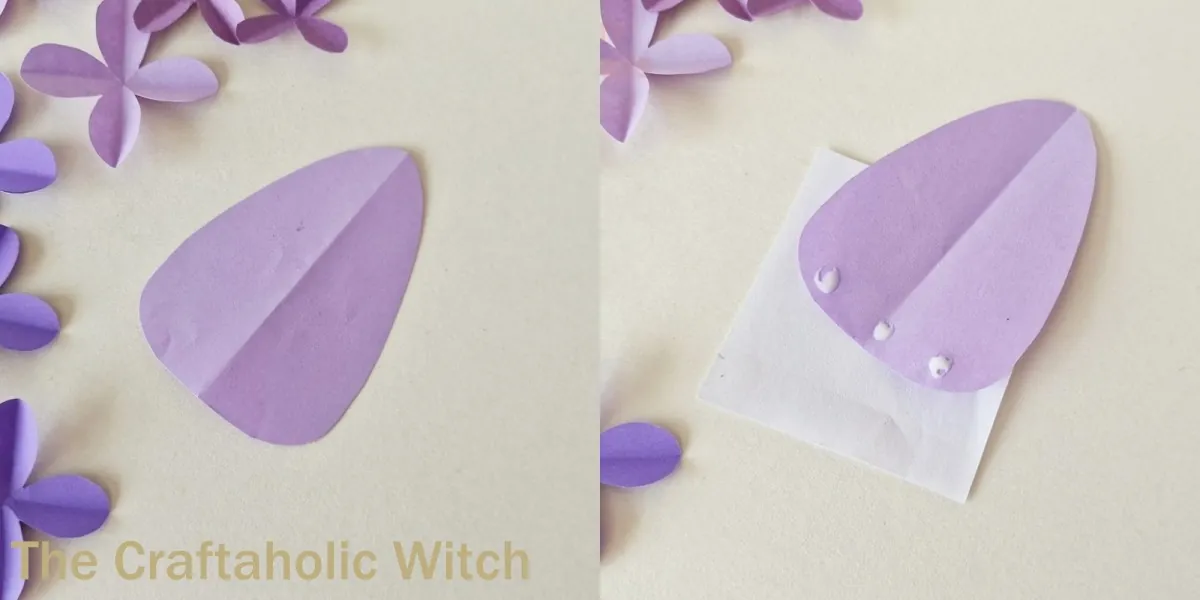 Paper lilac flower craft step 6 Gluing the first large petal onto the paper lilac flower base