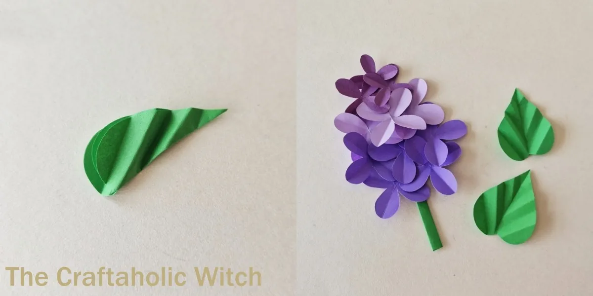 Paper lilac flower craft step 9 Folded green paper leaf and assembled paper lilac flower with stem