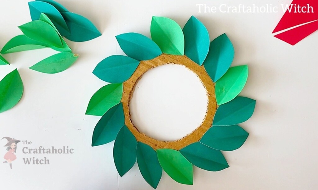 Paper Christmas Wreath Step 4 - Easy Paper Christmas Wreath Craft for Kids (+Free Template)