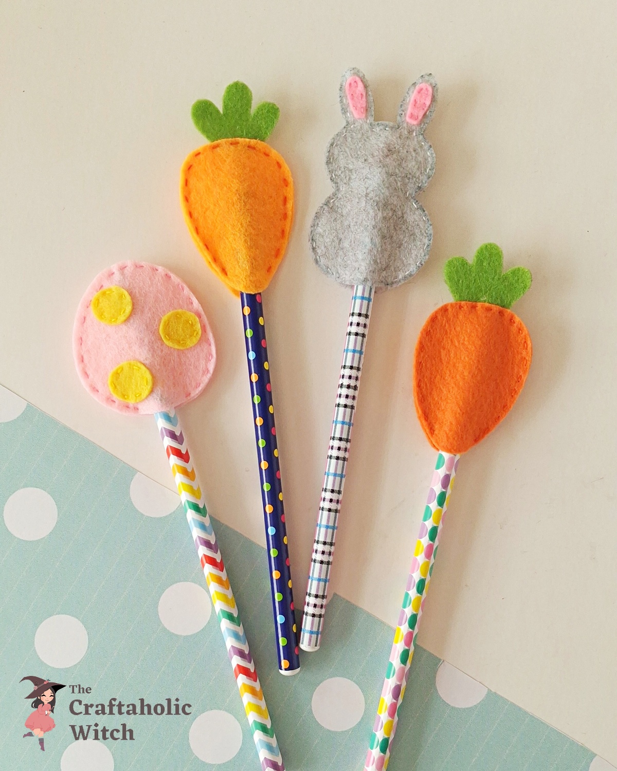 Felt Easter pencil toppers, egg, bunny, and carrot Felt Easter pencil toppers with egg, bunny, and carrot designs displayed together