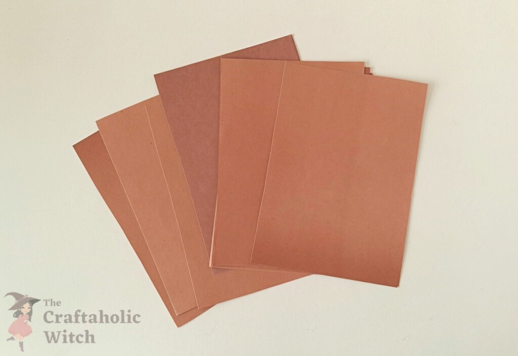 Ramadan decor step 1 - prepare papers Colored craft paper sheets cut to 16 by 10 cm for the Ramadan paper decor