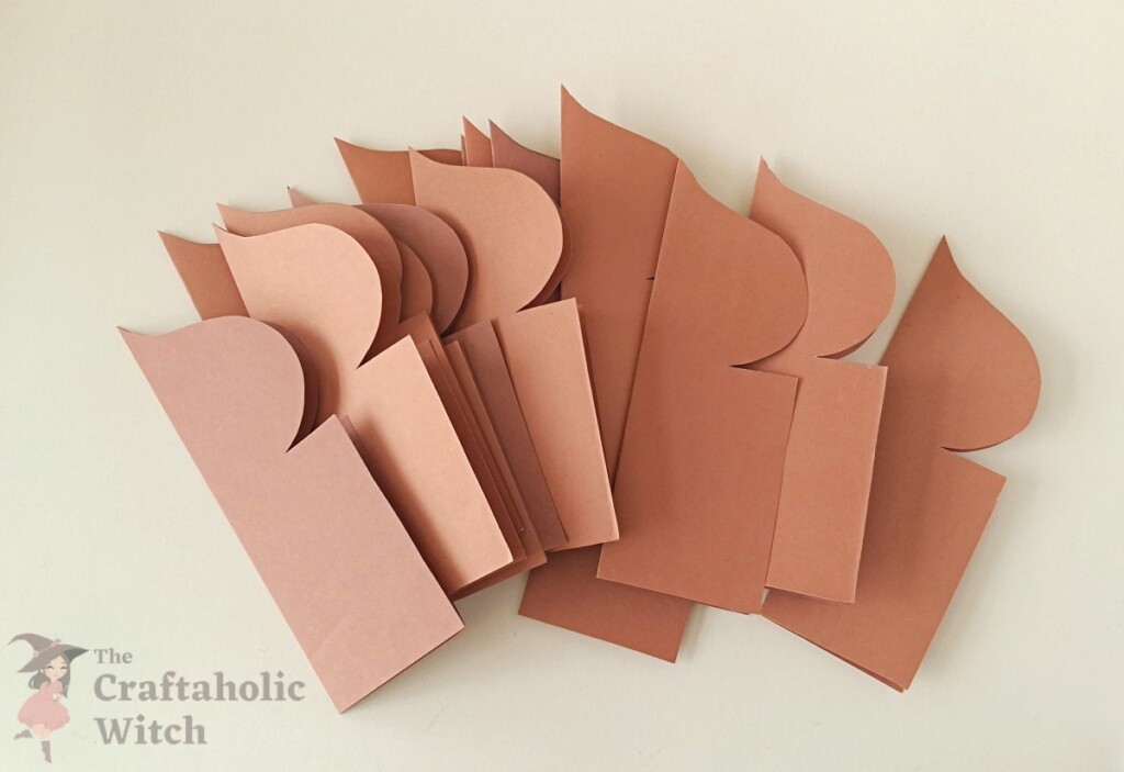 Ramadan decor step 5 - all cutouts ready All 16 to 18 dome-shaped paper cutouts prepared and stacked together