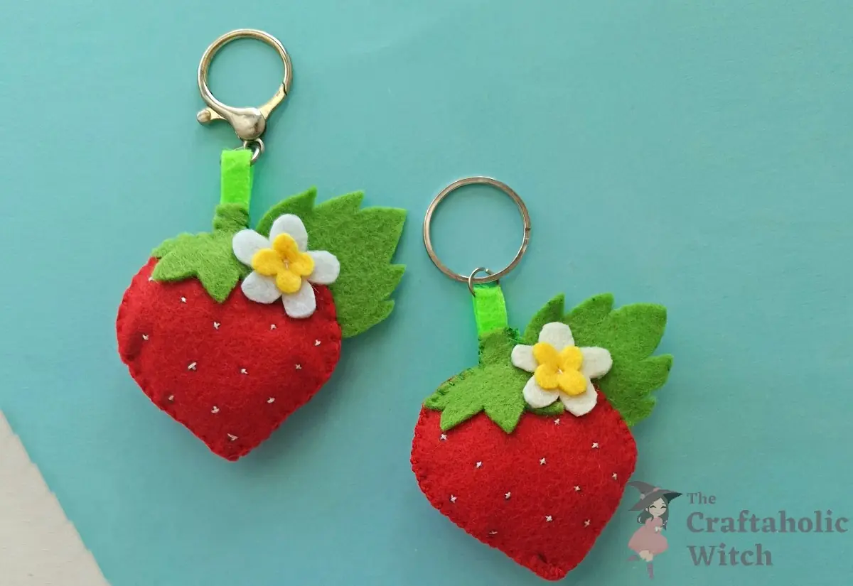 Completed felt strawberry keychains with rings attached