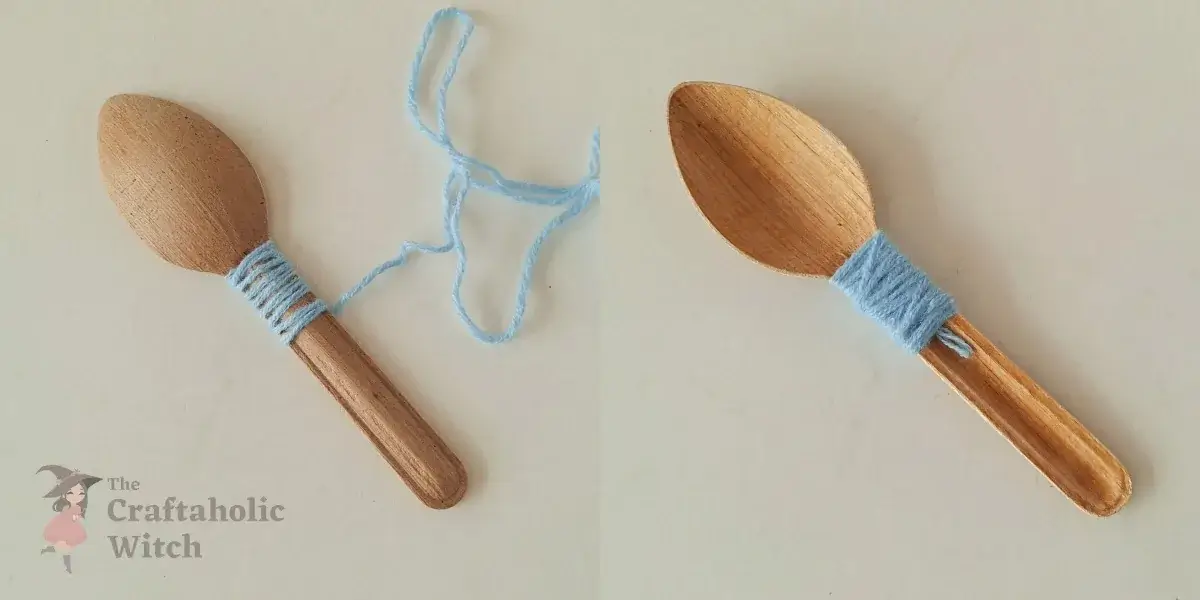 Wrapping yarn around spoon handle for fairy dress bodice Wrapping yarn tightly and evenly around the spoon handle below the bowl to create the recycled spoon fairy's dress bodice