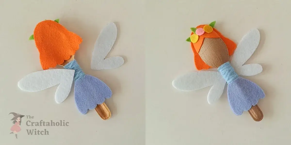 Gluing felt wings onto the back of the spoon fairy Pressing felt wing cutouts symmetrically onto the back of the spoon fairy and holding them flat while the glue sets