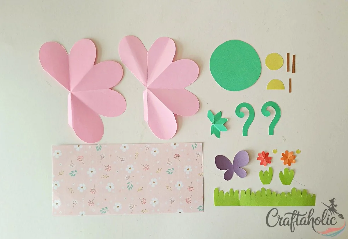 Printed fairy house template patterns traced and cut from colored craft paper
