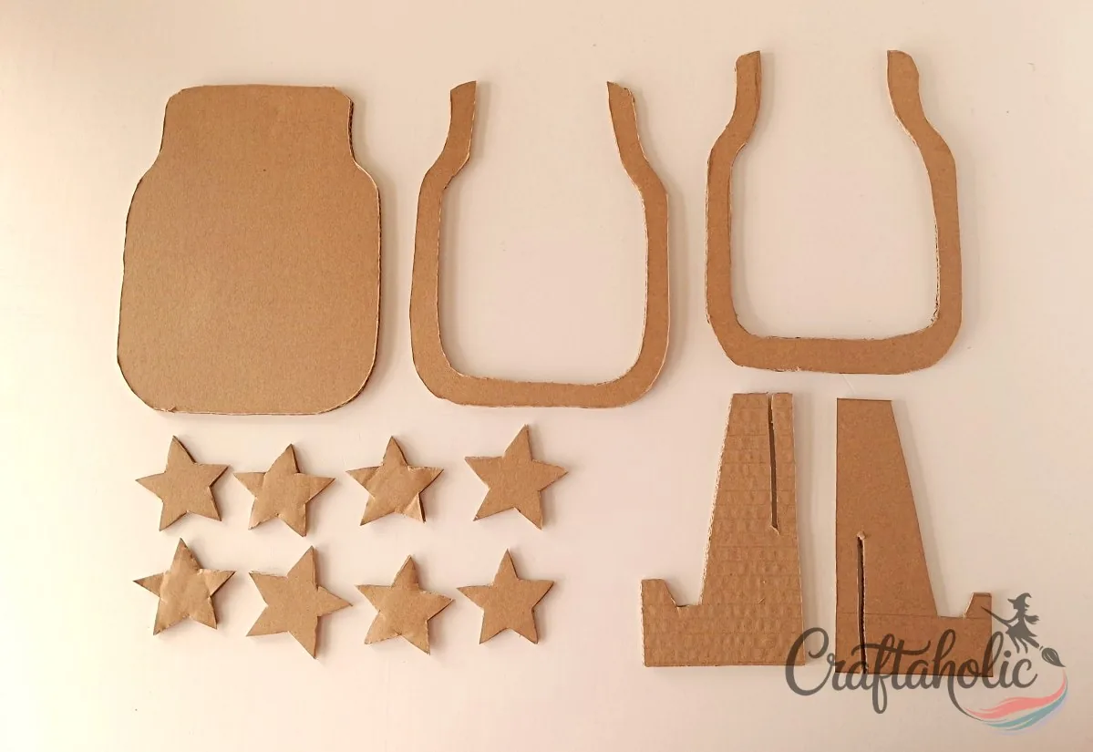 Cardboard pieces cut and ready for the reward jar Cardboard patterns cut out for the classroom reward jar, stand, and stars