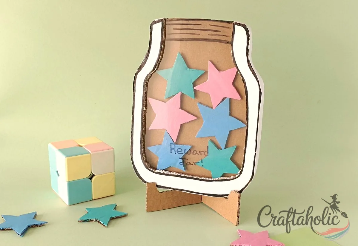 Finished classroom reward jar on its stand Finished classroom reward jar craft placed on its cardboard stand with stars