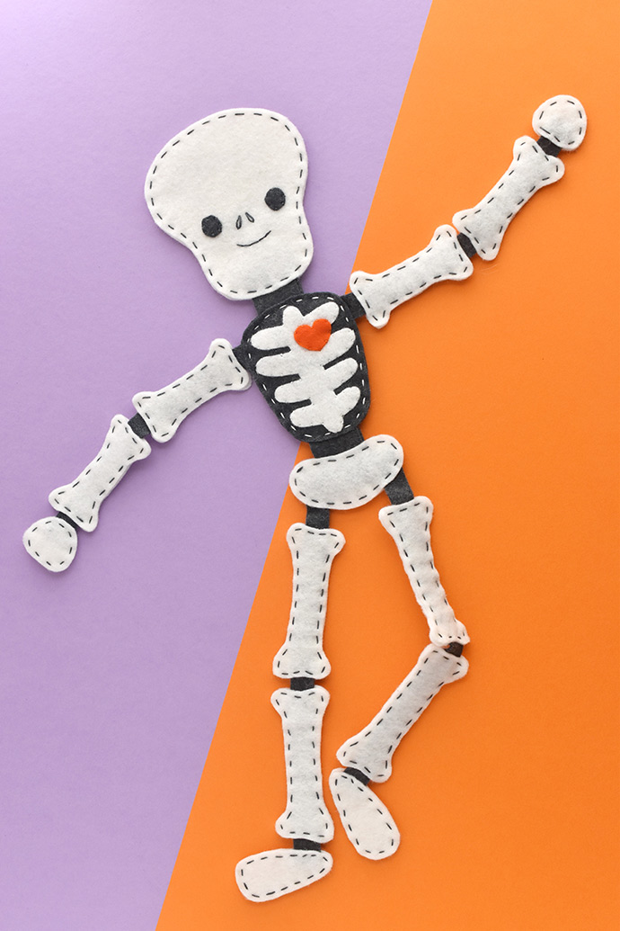 Felt skeleton plush: poseable felt skeleton softie with stitched bones