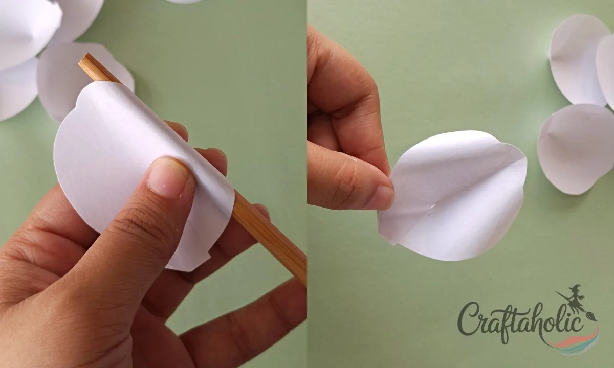 How to Make a Realistic Paper Gardenia Flower 5 Curling paper gardenia petal edges with a round craft stick for a realistic look