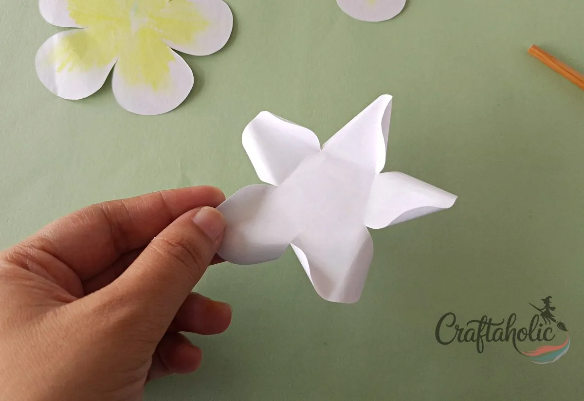 How to Make a Realistic Paper Gardenia Flower 9 Curling paper gardenia petals clockwise in sequence around the white center set