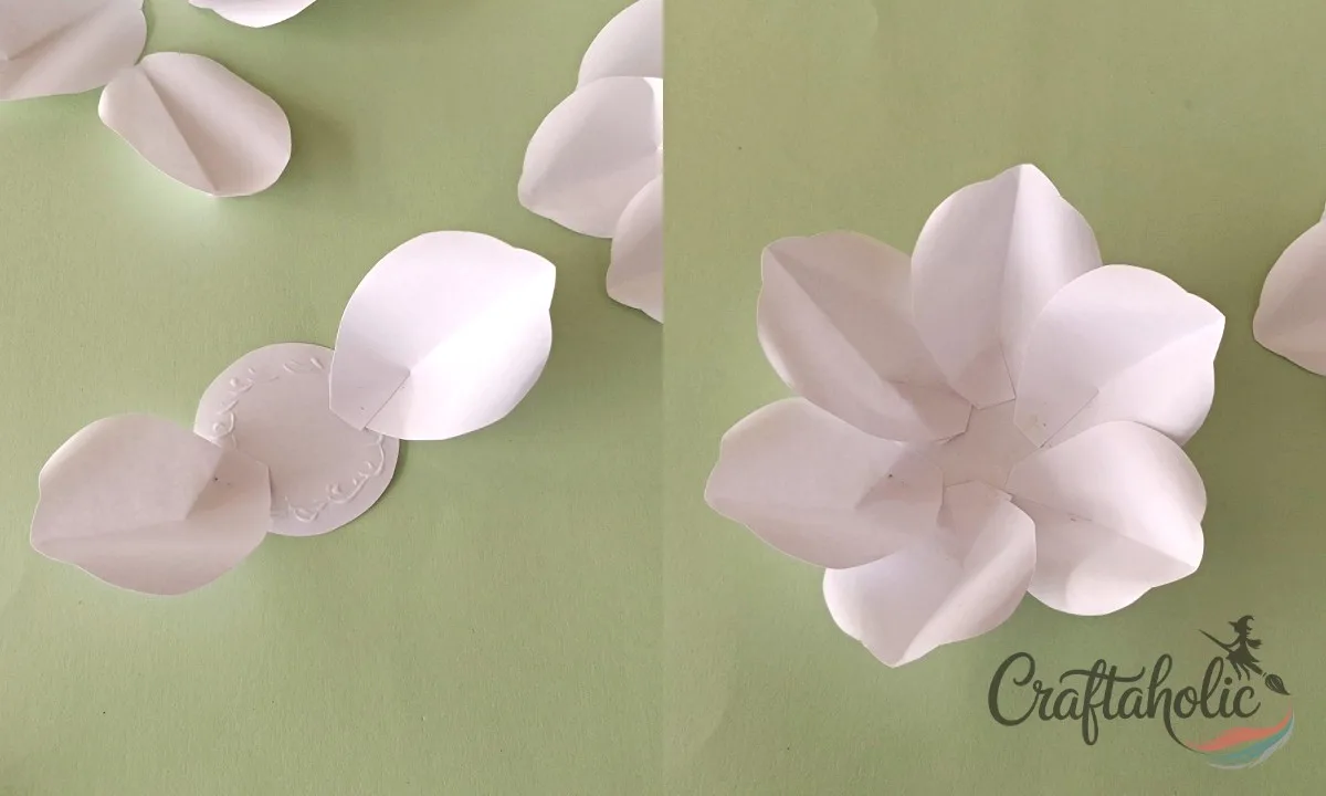 How to Make a Realistic Paper Gardenia Flower 17 Gluing the first layer of large petals around the paper gardenia flower base