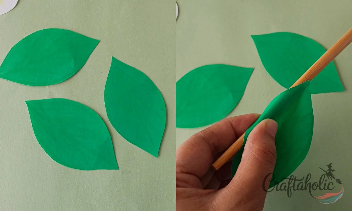 How to Make a Realistic Paper Gardenia Flower 20 Shading paper gardenia leaf cutouts with a darker green crayon for depth
