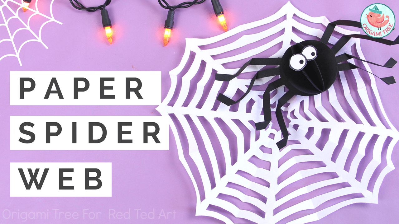 20 Easy Halloween Paper Crafts for Kids to Make at Home 14 Cut paper spider web with a paper spider hanging in a window for Halloween