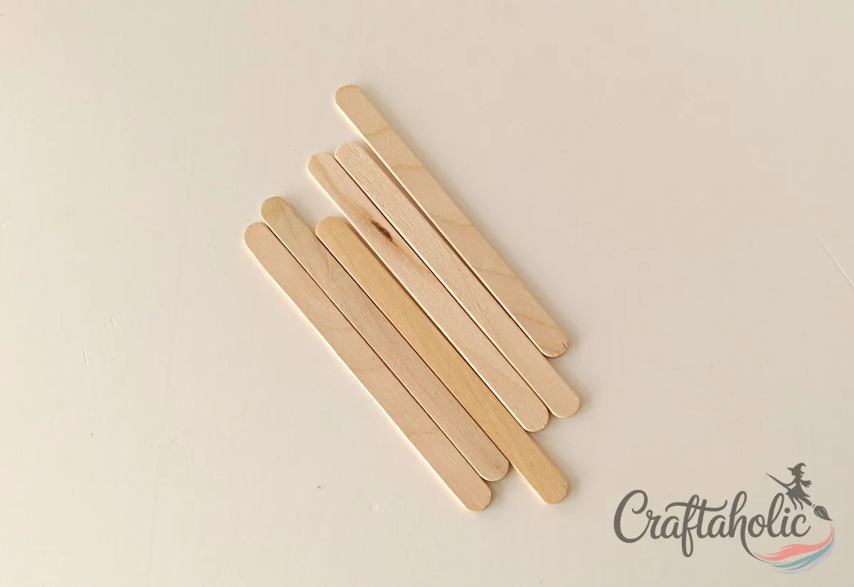 Selecting matching popsicle sticks Selecting eight matching popsicle sticks for the school bus photo frame