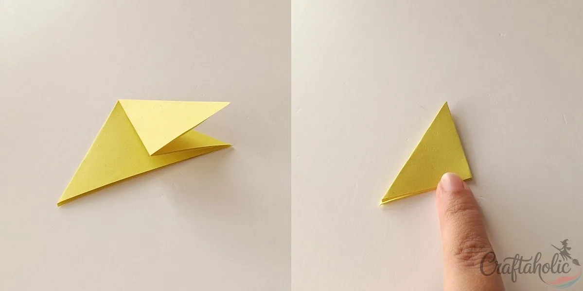 Folding the paper marigold petal flaps in half a third time