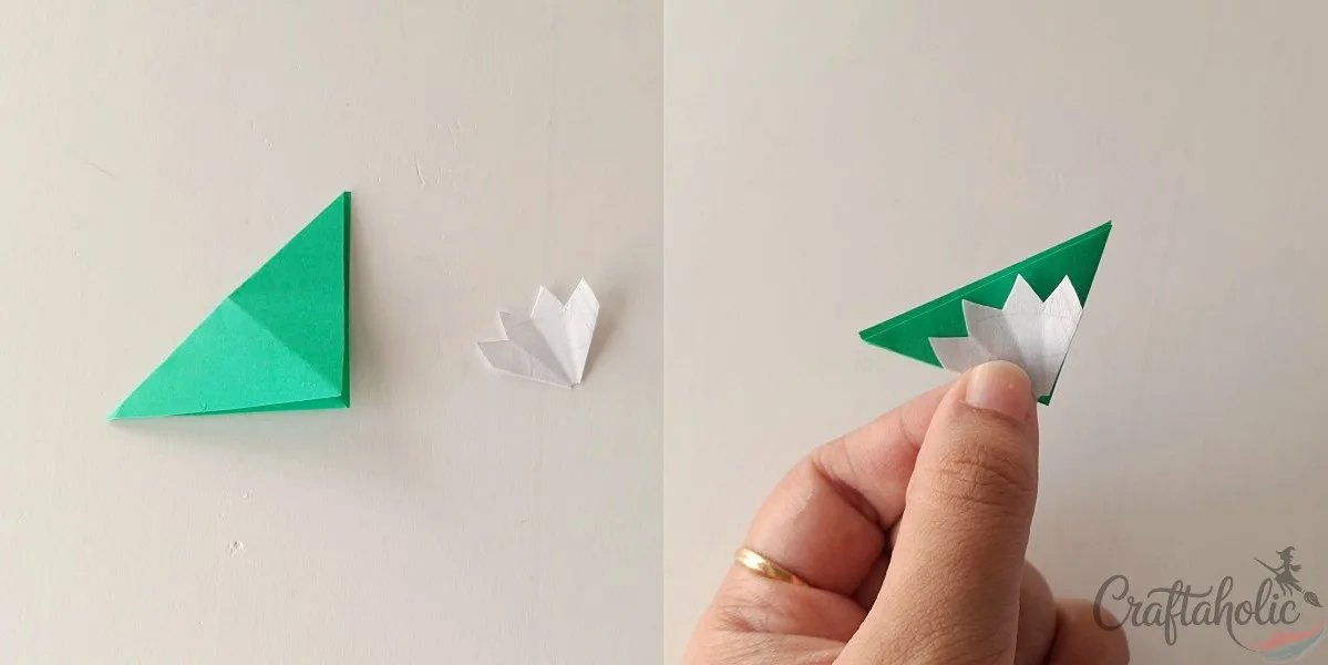 Tracing the zigzag sepal pattern onto folded green paper