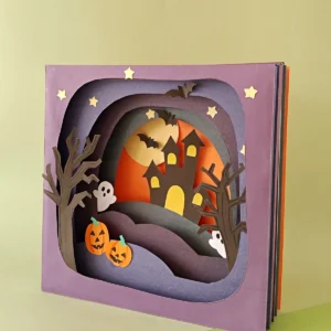 Side view of the layered paper Halloween shadow box showing the depth between the paper layers