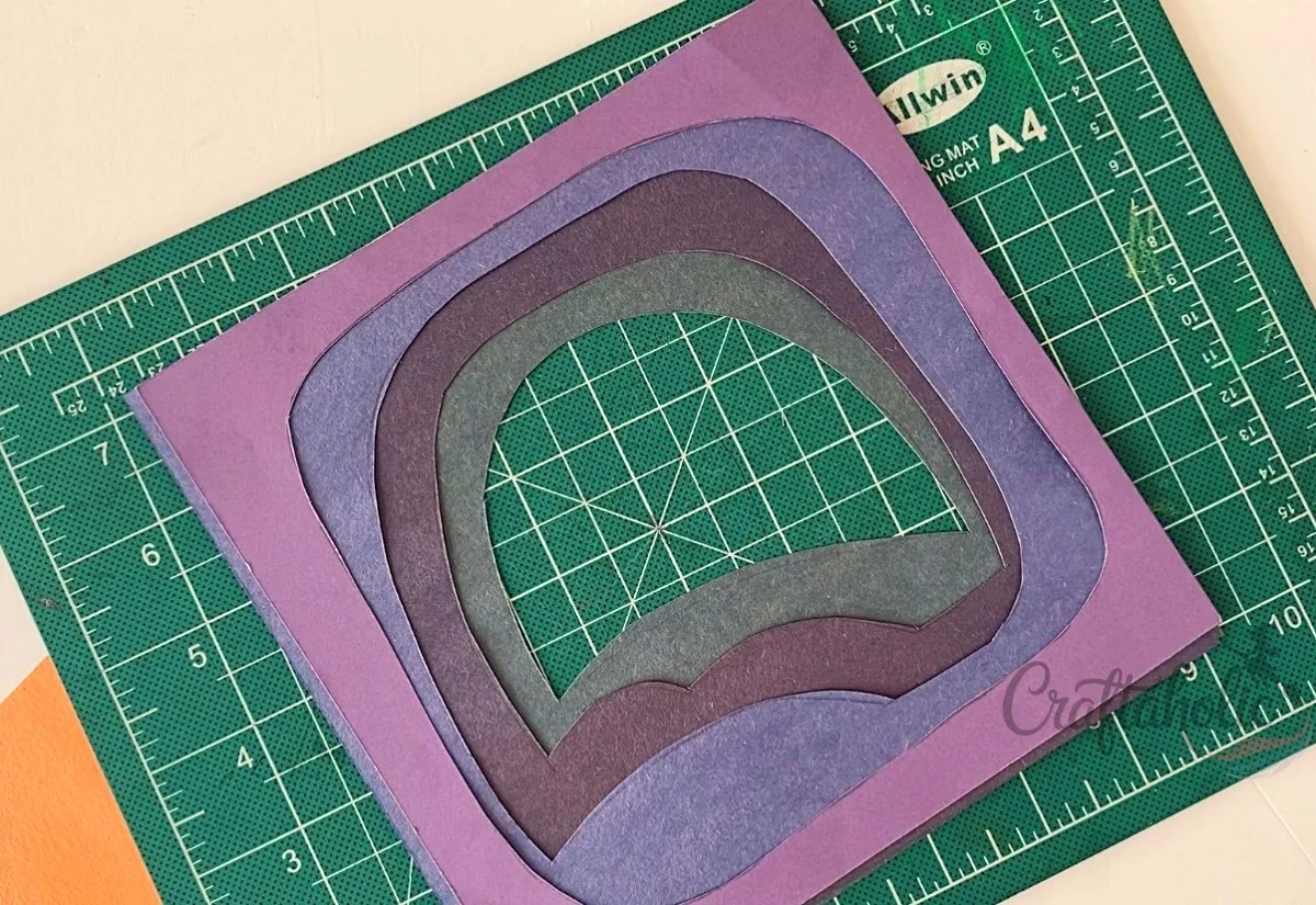Four cut layers stacked together All four layers cut out and stacked, from the top layer down to the first layer