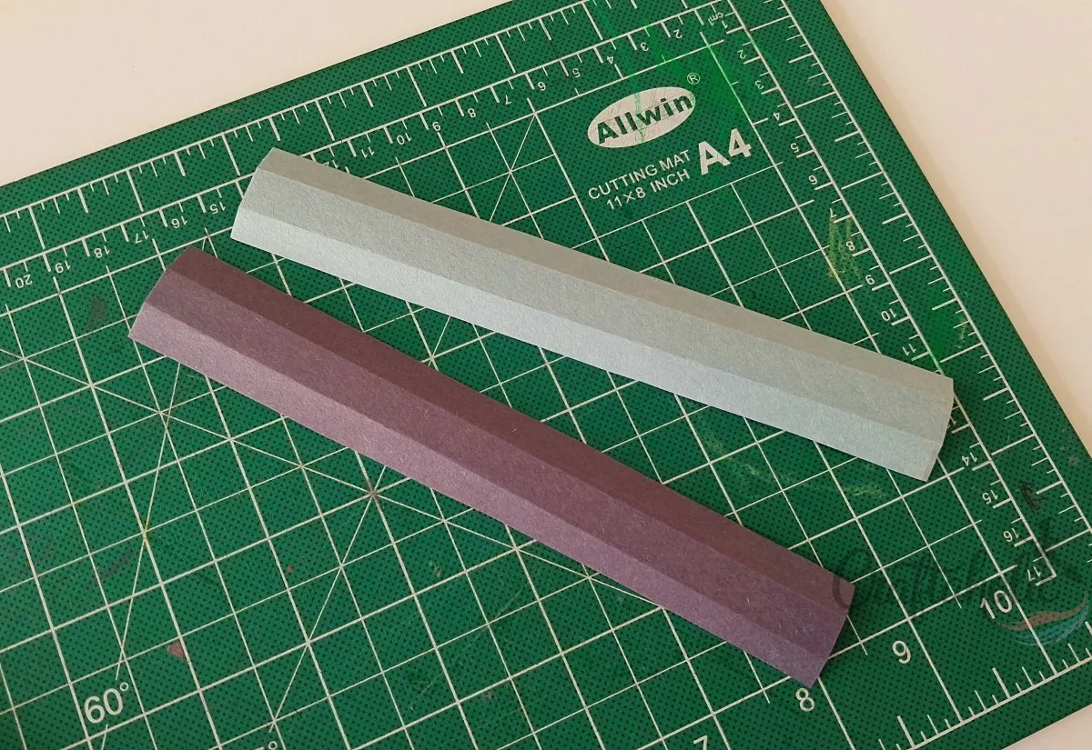 3D spacer strips cut to length Two 3 cm wide paper strips cut to the length of the layers