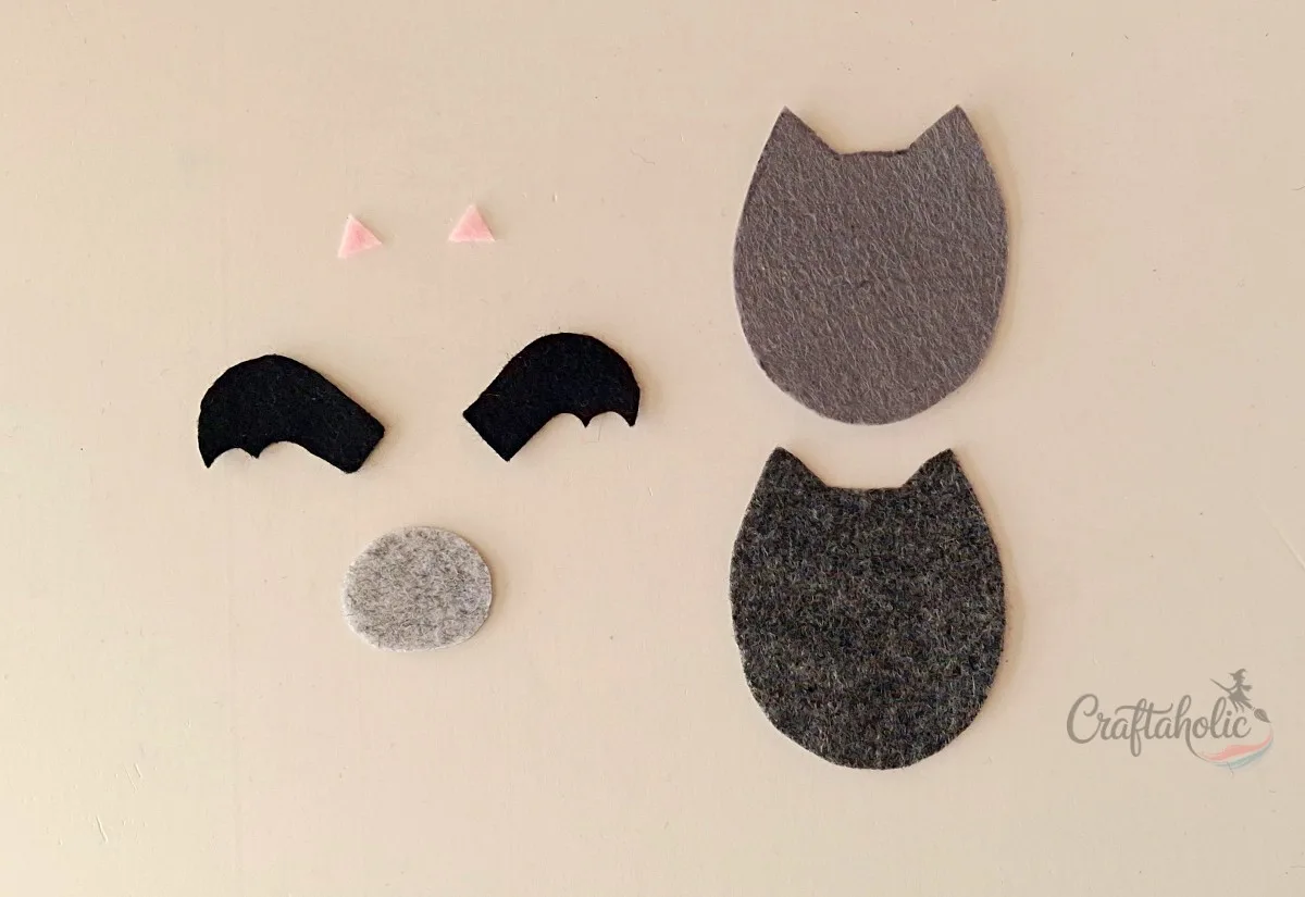 4 Easy to Make Felt Halloween Plushies (Bat, Cat, Ghost, Pumpkin) + Pattern 3 Tracing and cutting felt bat plush pattern pieces