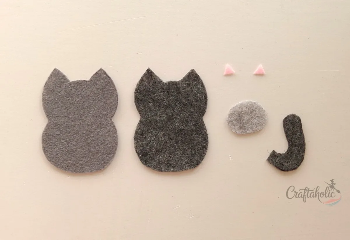 4 Easy to Make Felt Halloween Plushies (Bat, Cat, Ghost, Pumpkin) + Pattern 7 Tracing and cutting felt cat plush pattern pieces