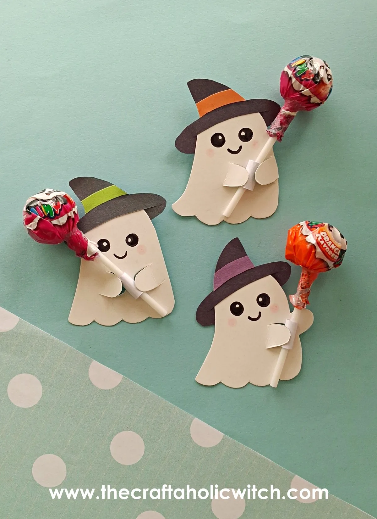Ghost lollipop holder Halloween craft DIY ghost lollipop holder craft with witch hats and colorful lollipops