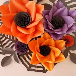 Halloween flower wall art made from colored cardstock paper flowers