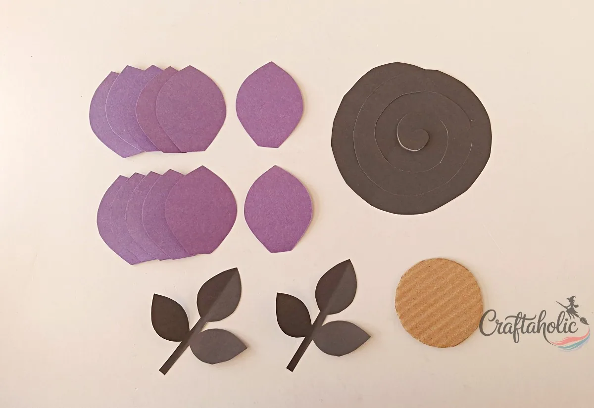 Tracing Halloween flower wall art patterns on colored cardstock