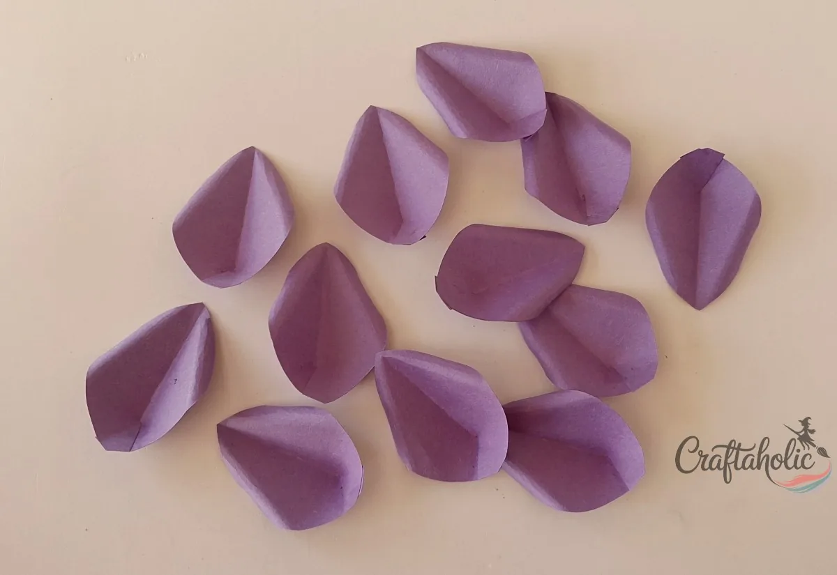Twelve prepared paper petals for one Halloween paper flower
