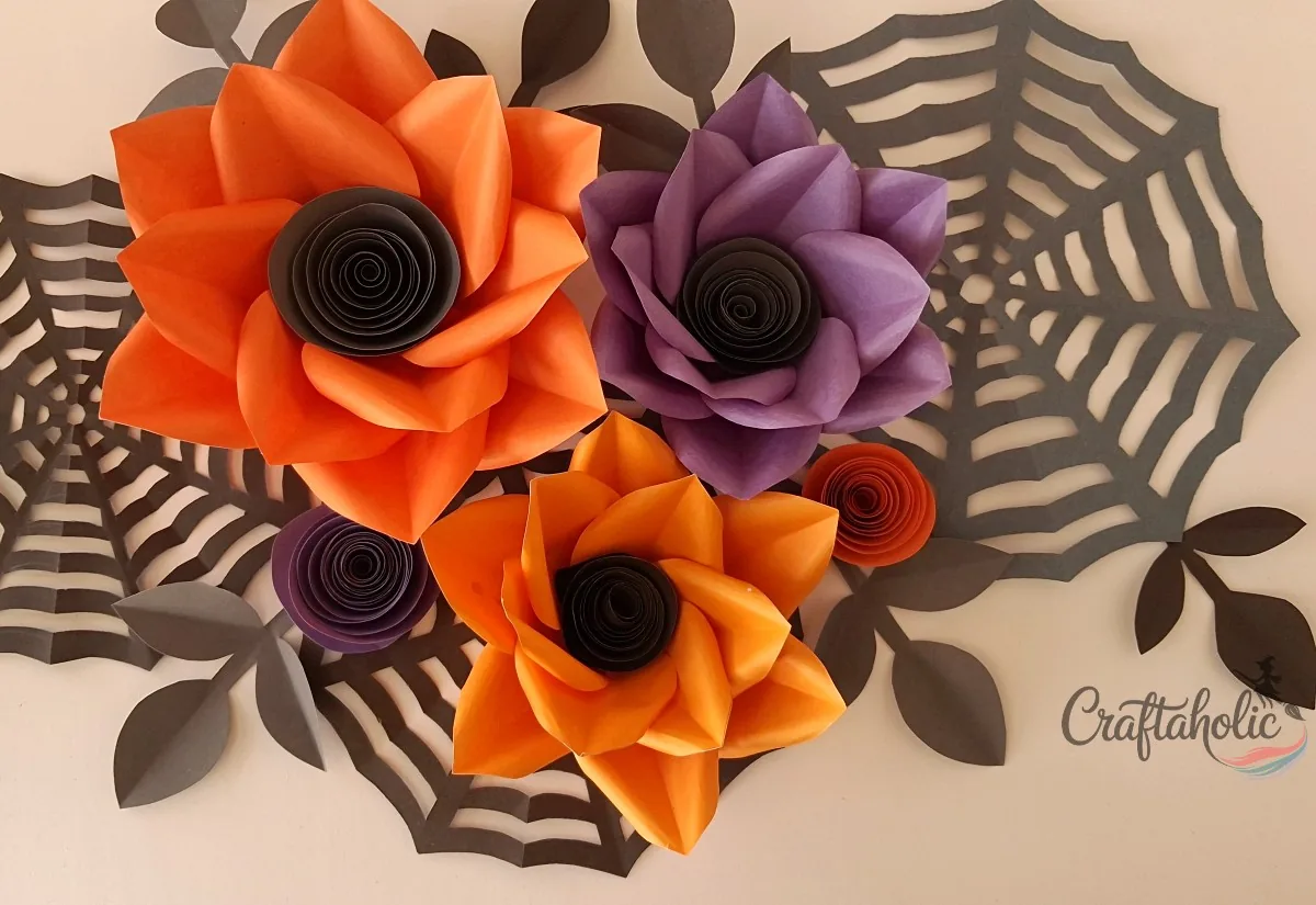 Completed Halloween flower wall art with paper flowers on the wall