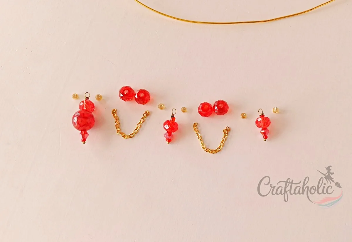 Beaded choker necklace, step 8 Arranging bead charms and chain to check the choker design