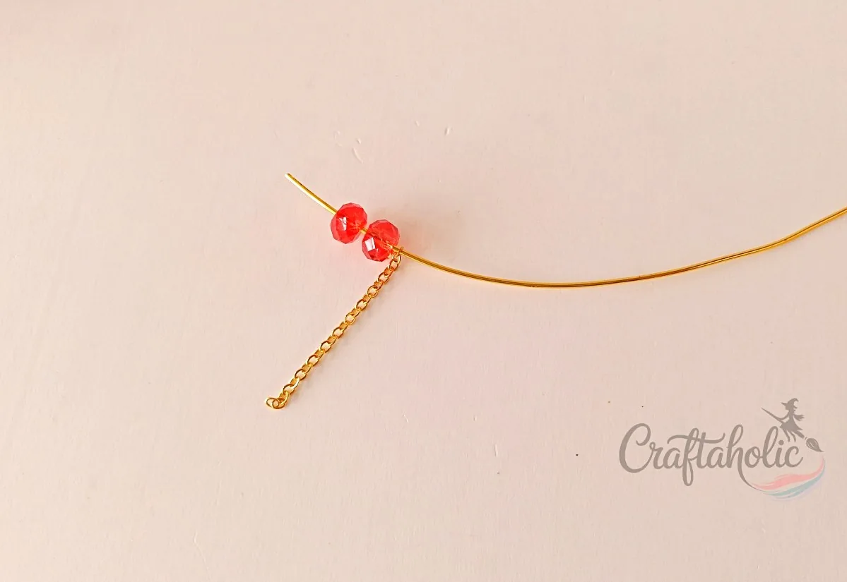 Beaded choker necklace, step 10 Inserting jewelry chain into the choker base wire