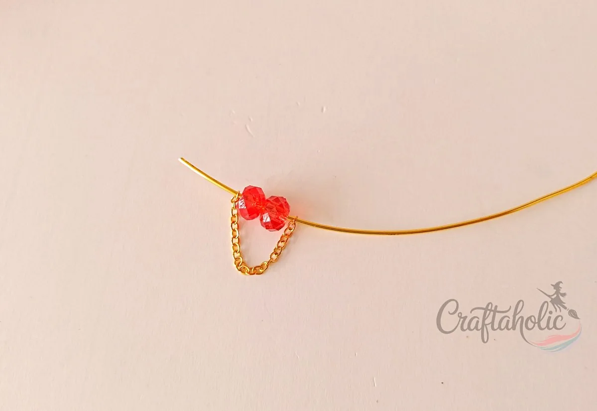 Beaded choker necklace, step 11 Forming a chain loop with crystal beads between the chain ends