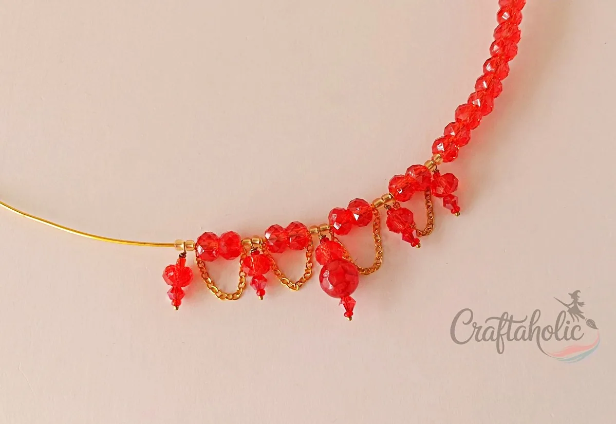 Beaded choker necklace, step 13 Completing the main beaded charm design of the choker