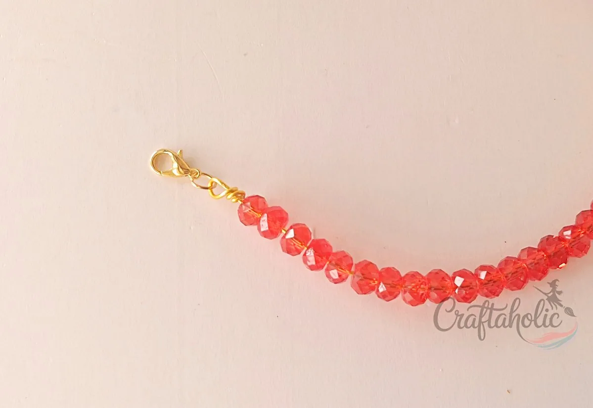 Beaded choker necklace, step 16 Attaching the lobster claw clasp to the beaded choker