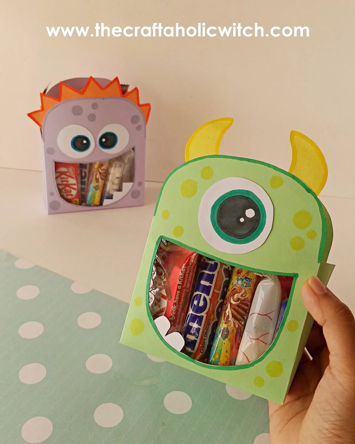 Two DIY monster snack boxes standing side by side