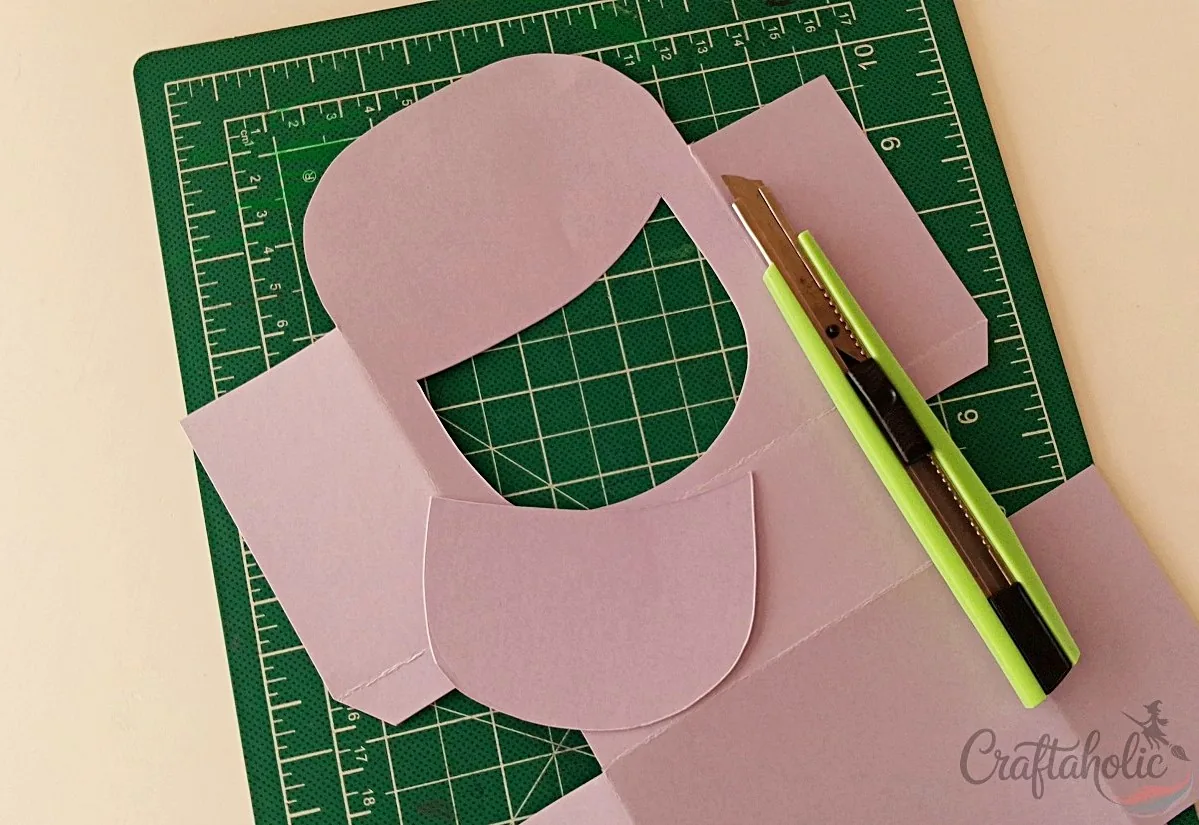 Cutting the mouth shape into the monster snack box template