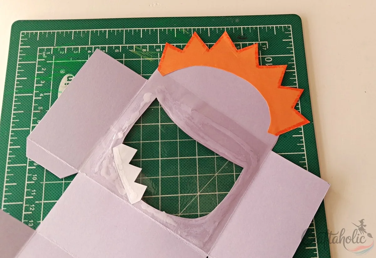 Attaching horns to the top of the monster snack box