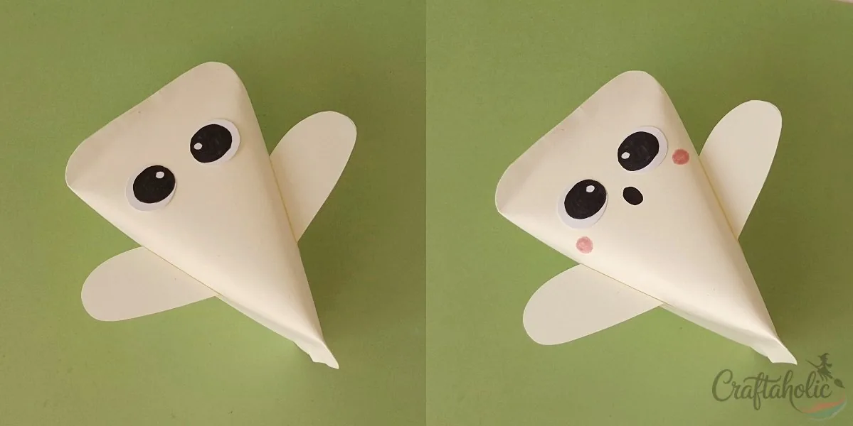 Ghost treat box, step 5: drawing the face Drawing the ghost's face on the finished paper treat box