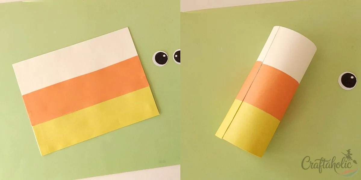 Candy corn treat box, step 2: attaching color layers Attaching the yellow and orange paper cutouts to the candy corn treat box base
