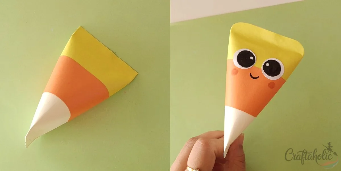 Candy corn treat box, step 3: securing sides Securing the sides and drawing the face on the candy corn treat box